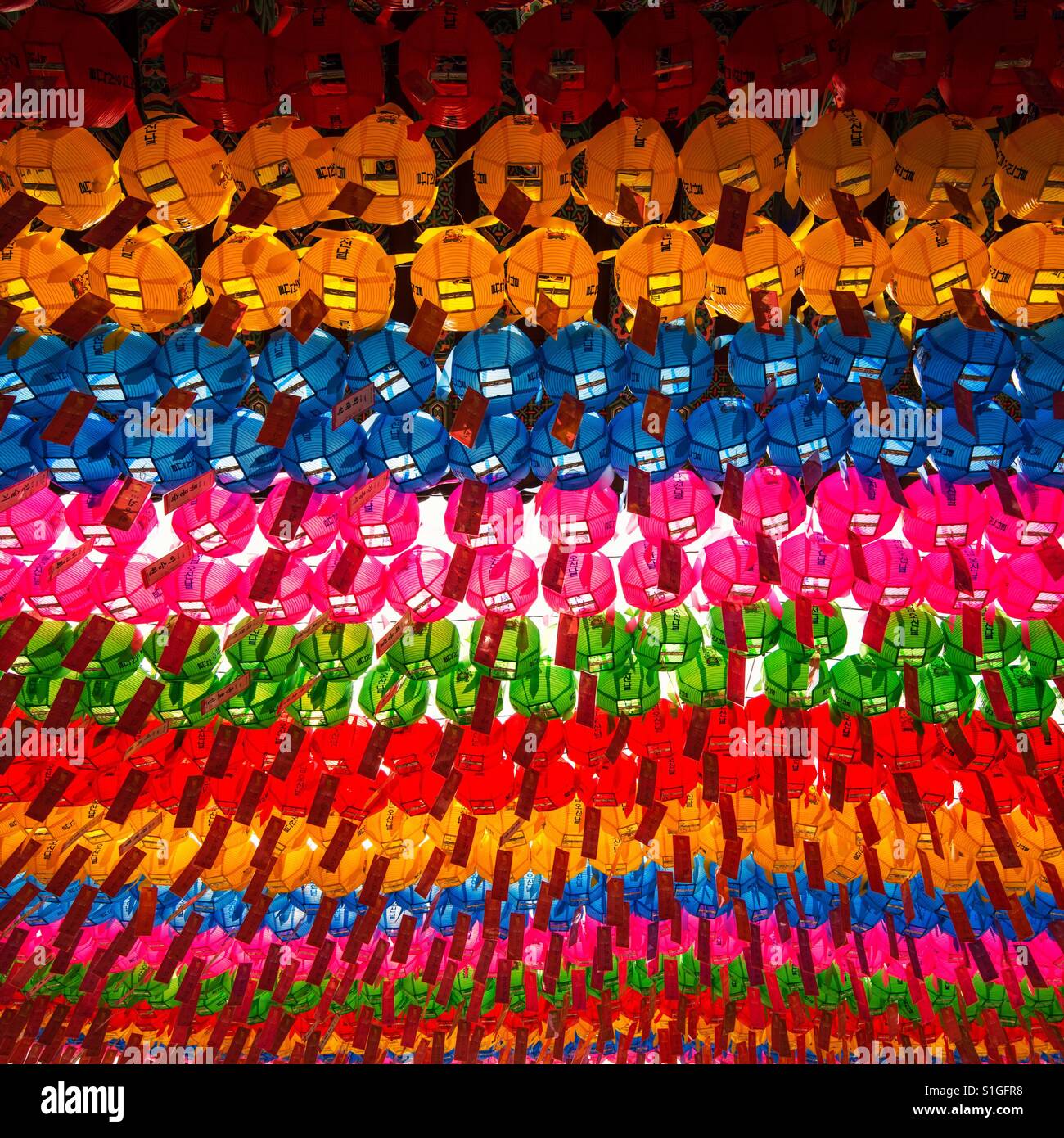 Display of colourful paper lanterns to celebrate Buddha’s birthday at Jogyesa Temple, Seoul, South Korea - Smartphone Captured Stock Image