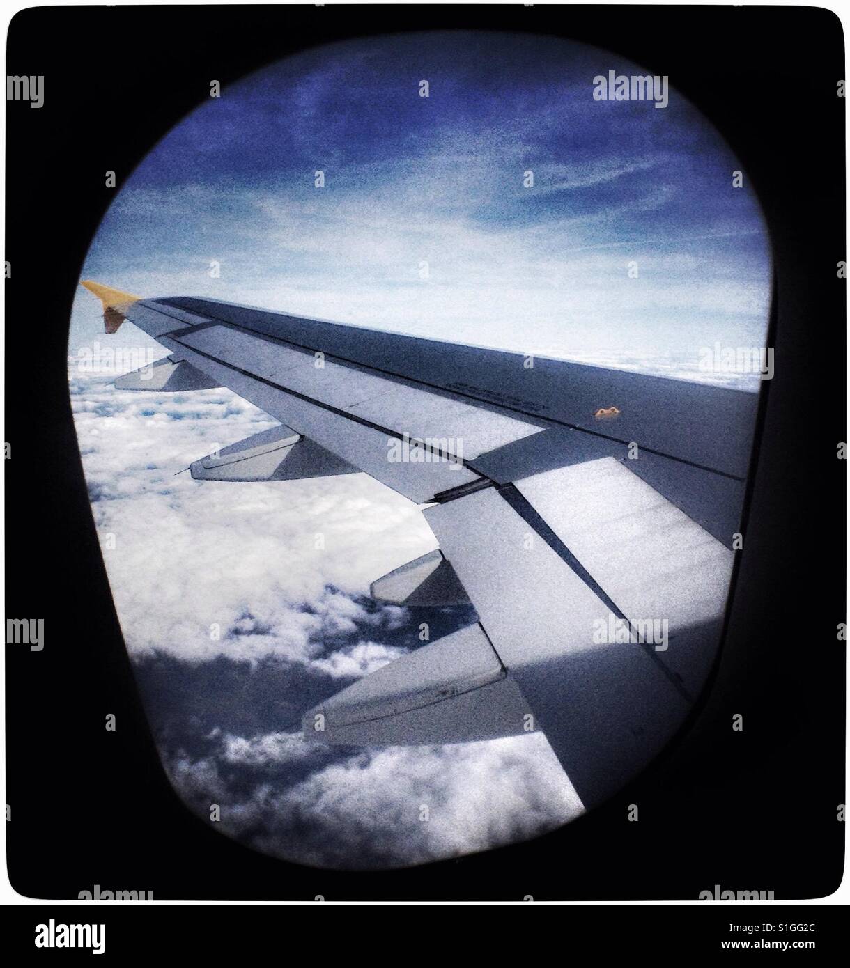 The view from seat 19A on a Monarch Airways flight from Leeds Bradford Airport, UK. - Smartphone Captured Stock Image