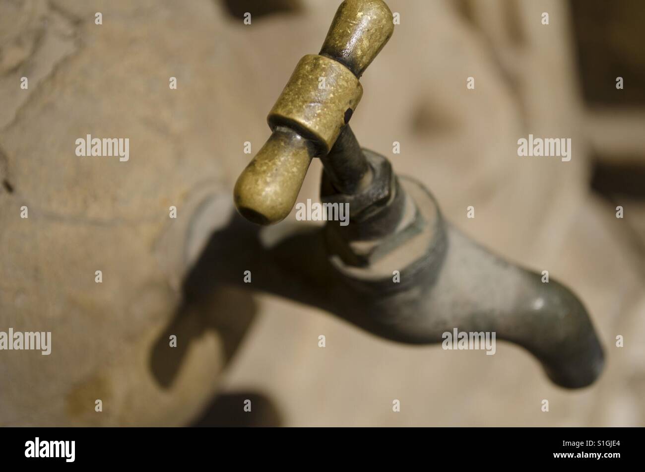 Old Water Tap in an Arid Environment - Smartphone Captured Stock Image