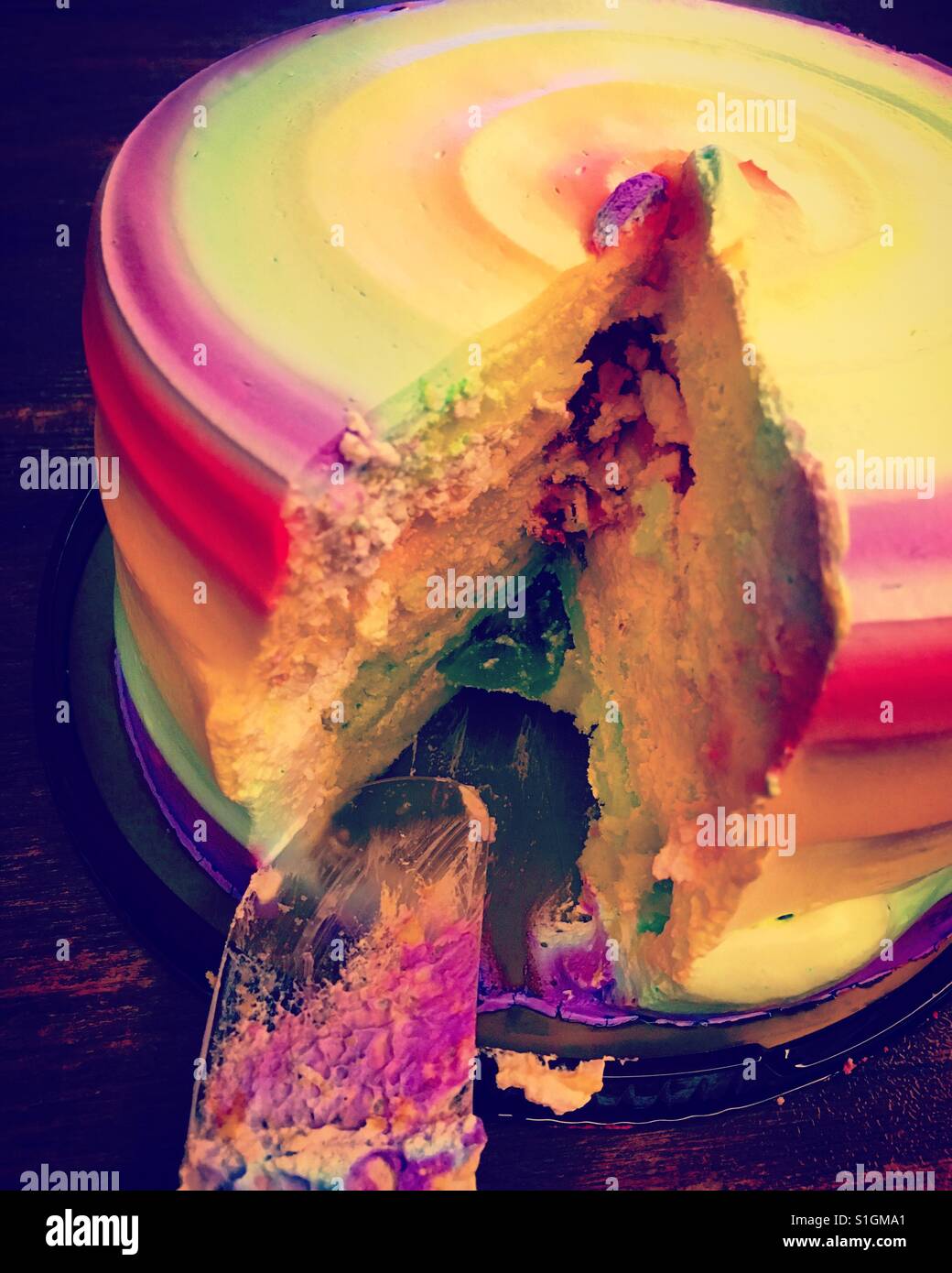 Colorful rainbow cake cutted - Smartphone Captured Stock Image