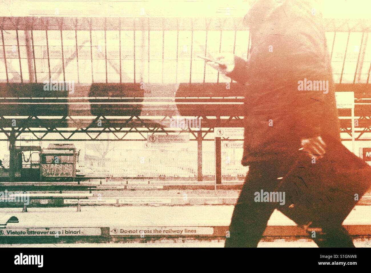 Commuter in the train station - Smartphone Captured Stock Image