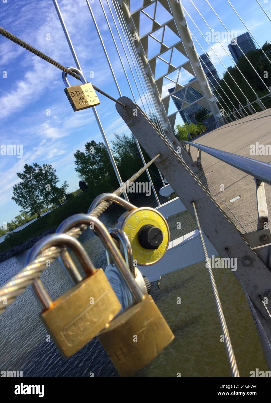 Love locks on the Humber Bay bridge in Etobicoke, Toronto. - Smartphone Captured Stock Image