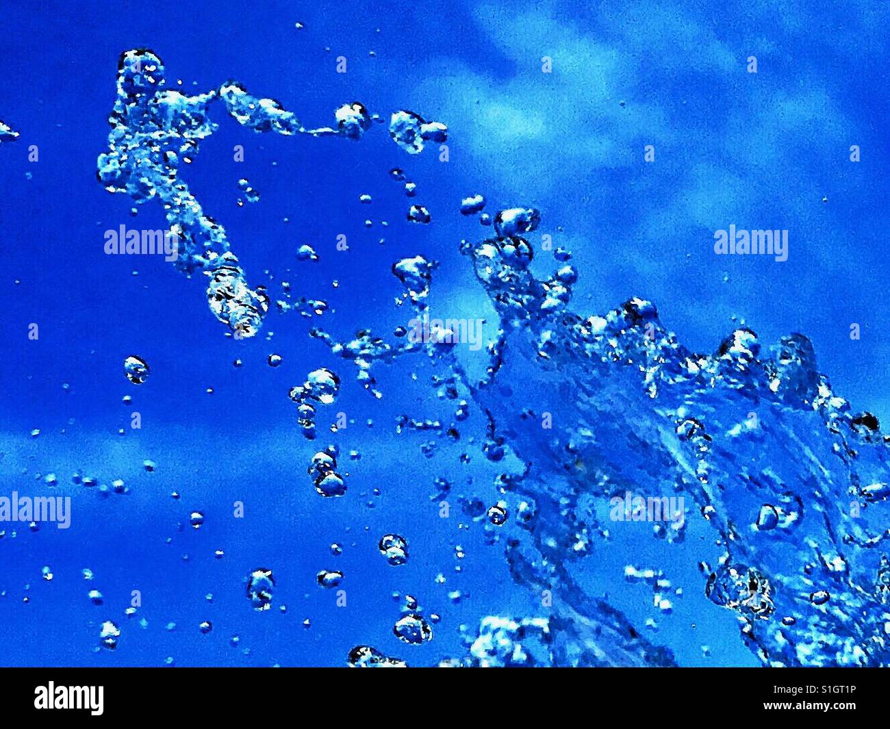 Still water splash Stock Photo Alamy