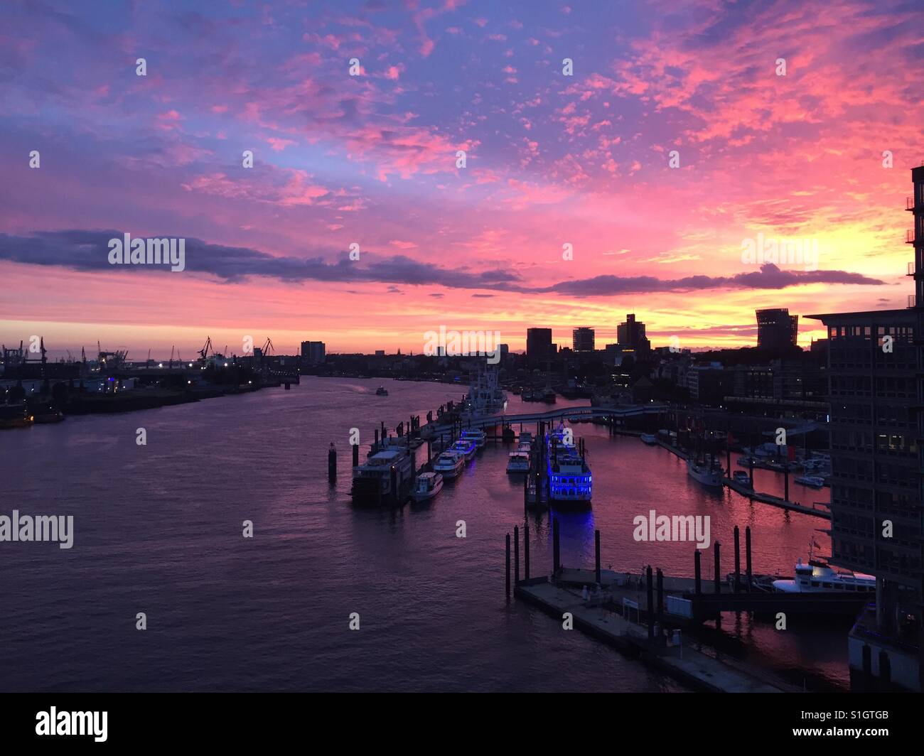 Hamburg harbour by night Stock Photo
