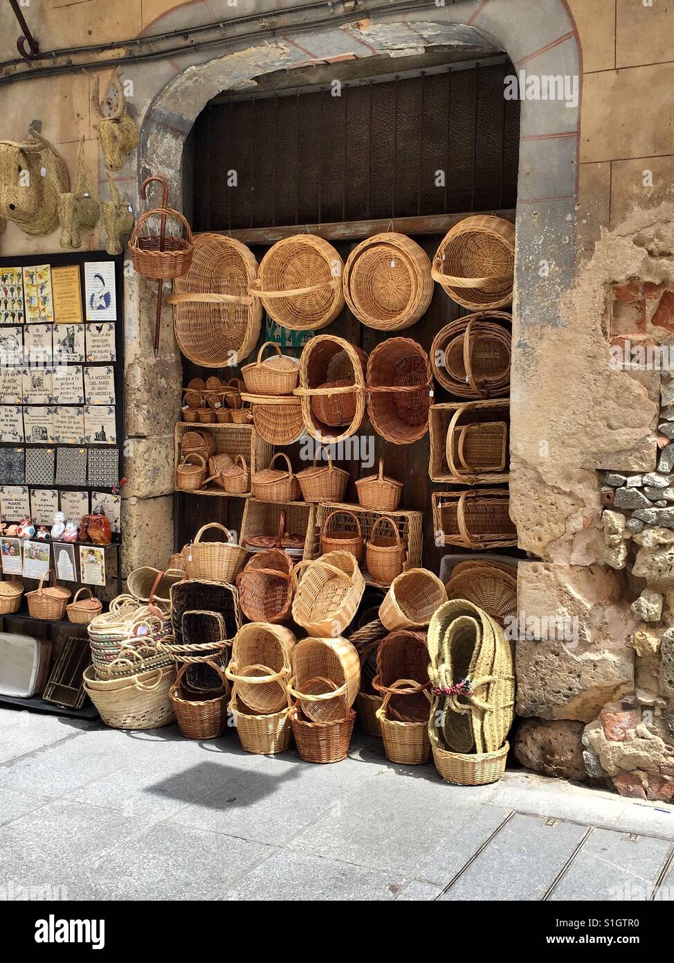 Hey Spanish store selling baskets Stock Photo Alamy