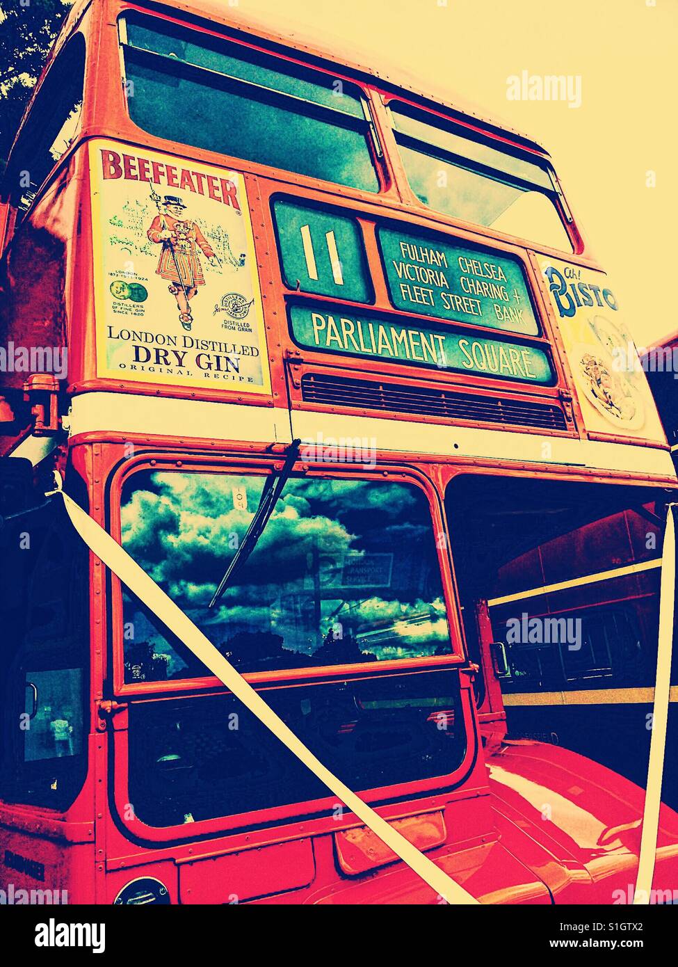 Original London double decker routemaster bus decorated with ribbon for wedding - Smartphone Captured Stock Image
