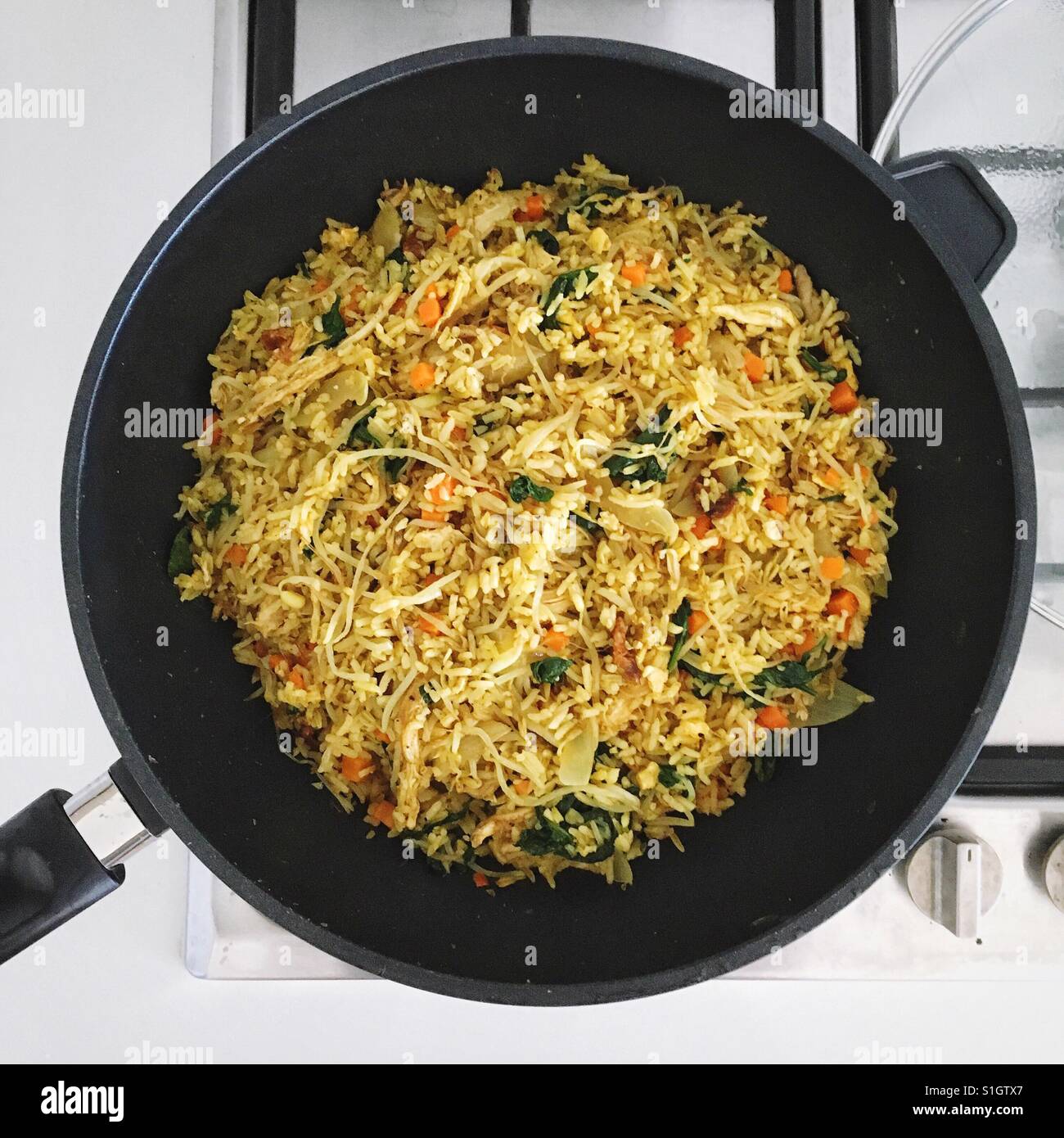 Curry Fried Rice in a Wok Stock Photo Alamy