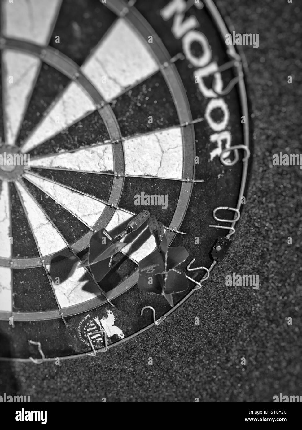 Well placed darts in a nice grouping. Stock Photo