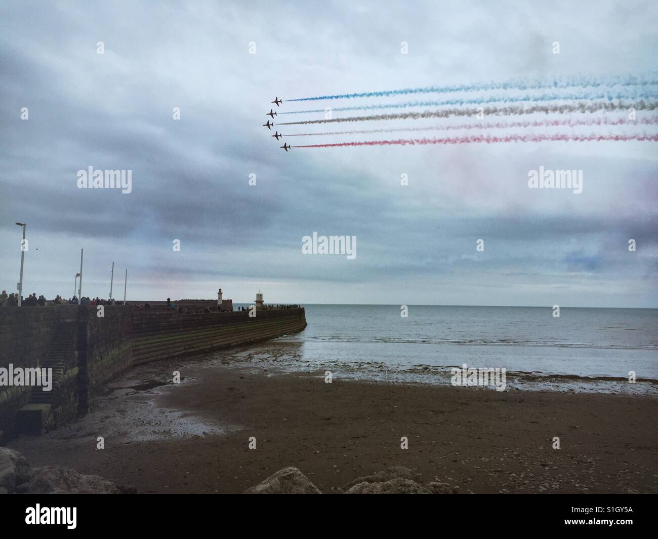 The RAF Red Arrows flying over Whitehaven in Cumbria, UK - Smartphone Captured Stock Image