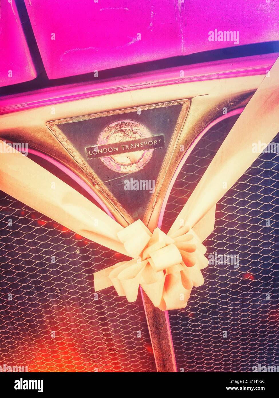 Wedding ribbon on pink bus - Smartphone Captured Stock Image