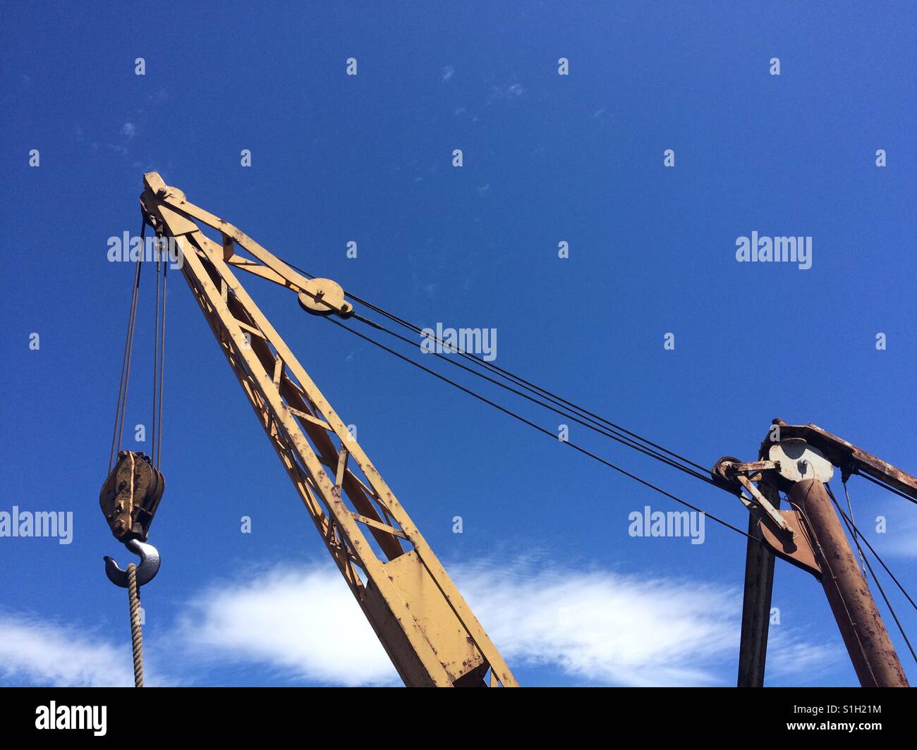 Crane against a blue sky - Smartphone Captured Stock Image