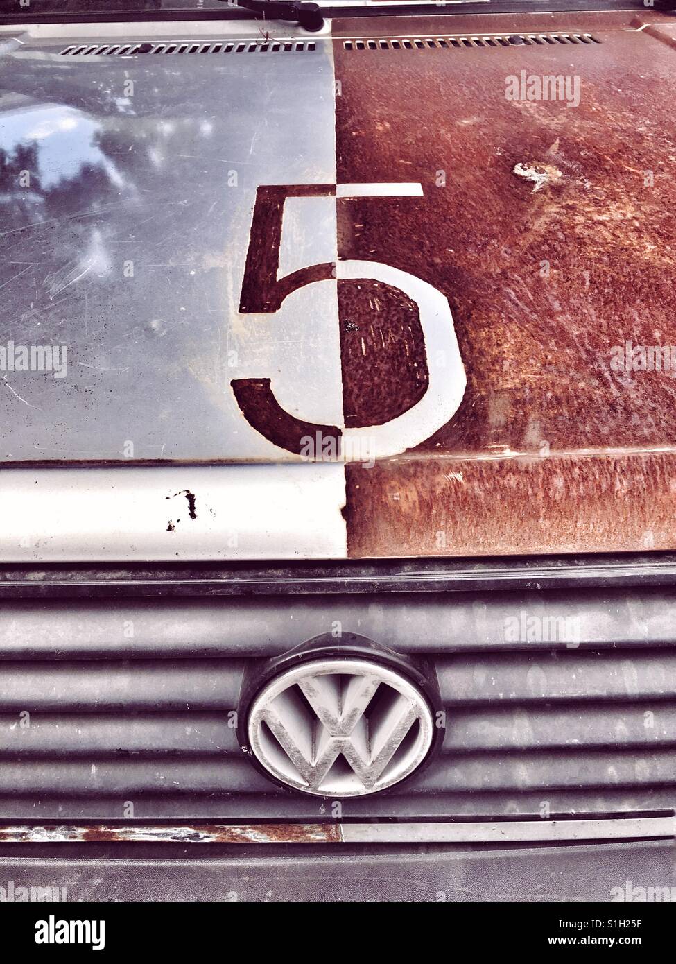 The hood of a vintage Volkswagen Golf with a number 5 written on it Stock Photo