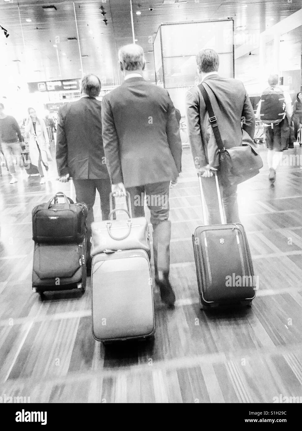 Business men at an airport Stock Photo