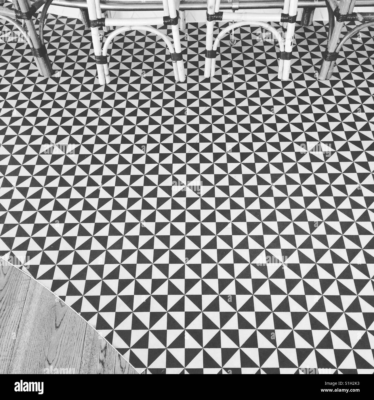 Black and white checkered floor at Fifteen restaurant, Cornwall - Smartphone Captured Stock Image
