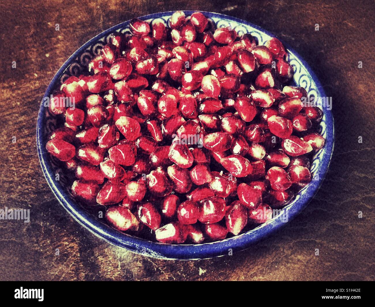 A bowl of Pomegranate arils (seeds), Punica granatum - Smartphone Captured Stock Image