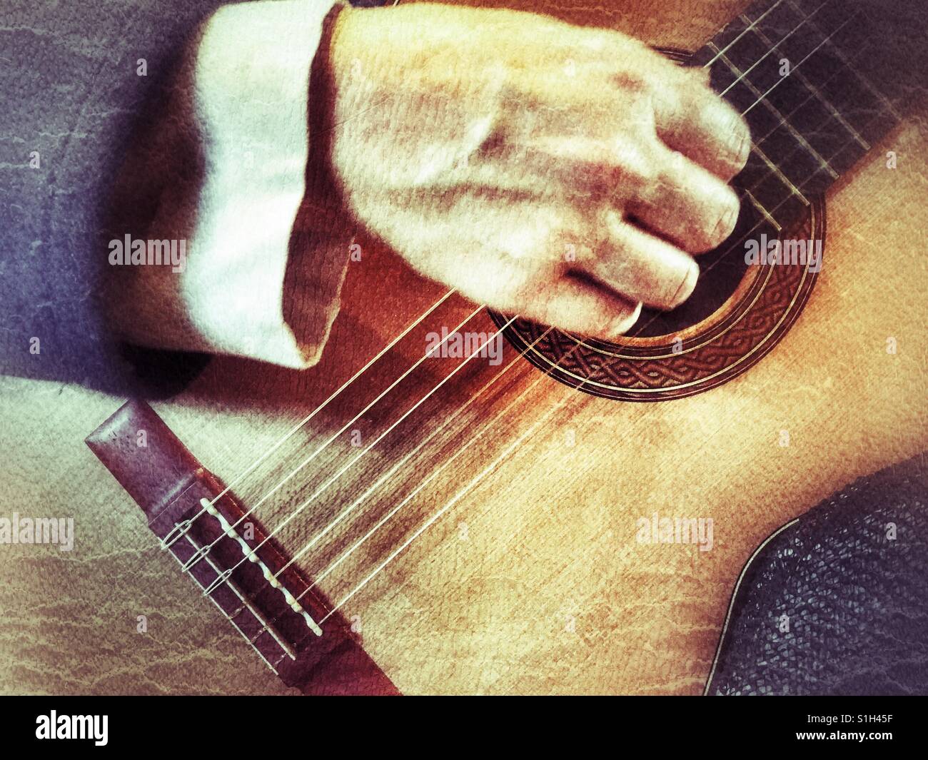 Guitarist playing classical guitar - Smartphone Captured Stock Image