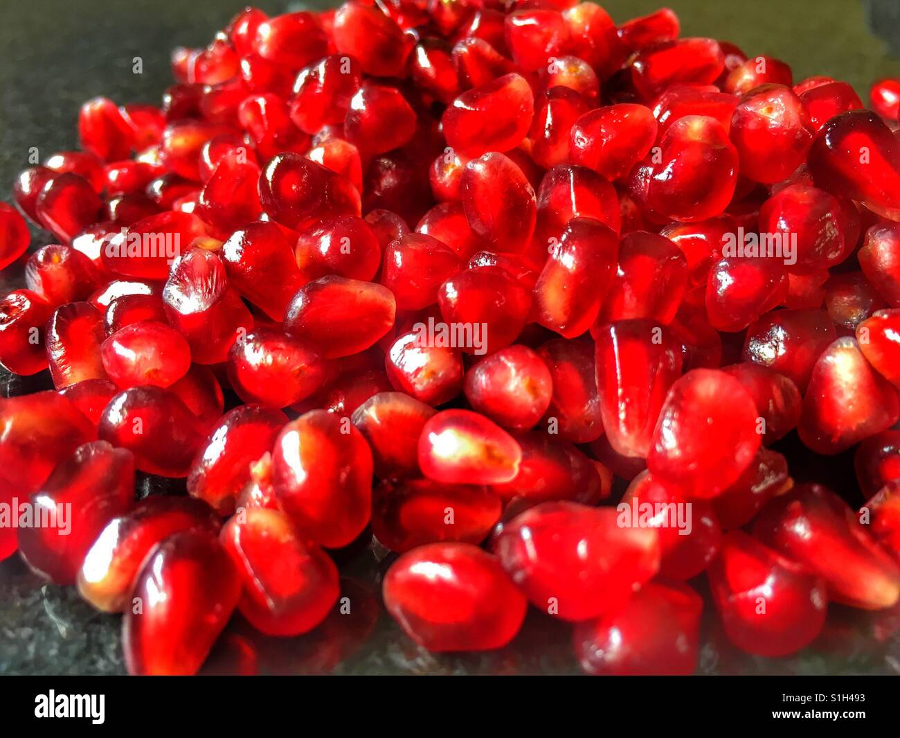 Pomegranate arils (seeds), Punica granatum - Smartphone Captured Stock Image