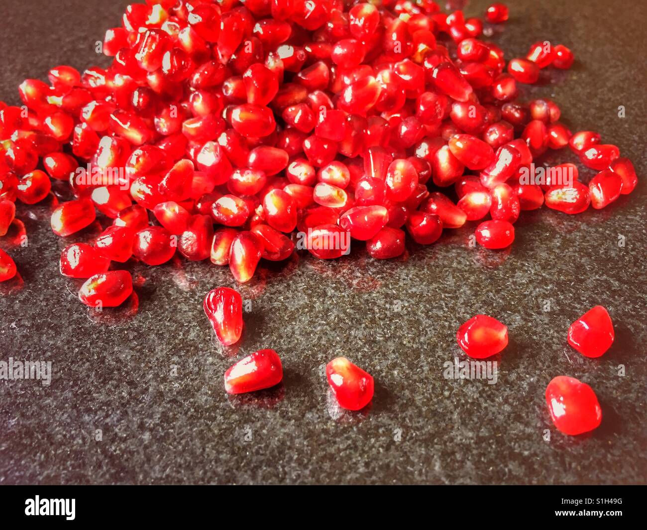 Pomegranate arils (seeds), Punica granatum - Smartphone Captured Stock Image
