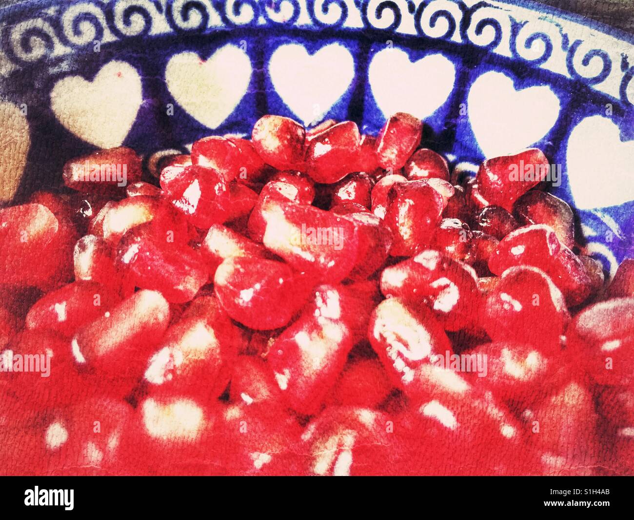 A bowl of Pomegranate arils (seeds), Punica granatum - Smartphone Captured Stock Image