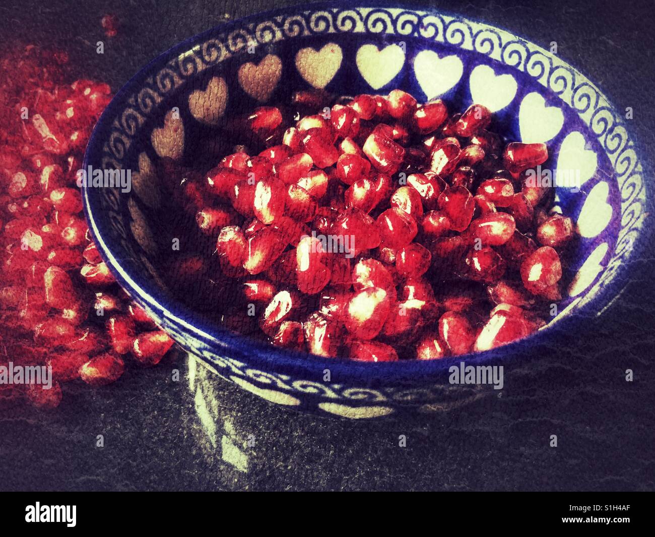 A bowl of Pomegranate arils (seeds), Punica granatum - Smartphone Captured Stock Image