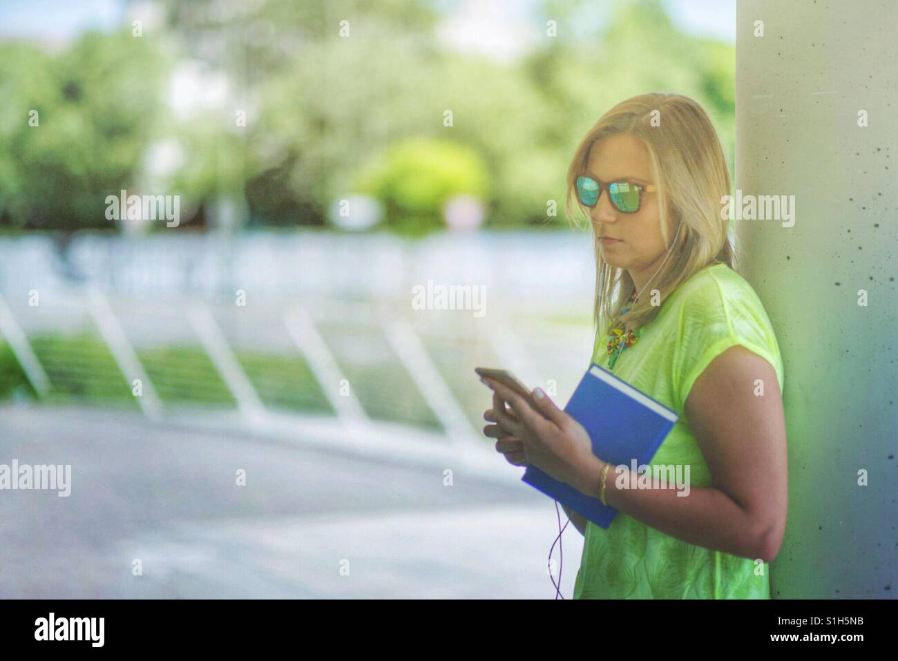 Young woman checking her work appointments Stock Photo