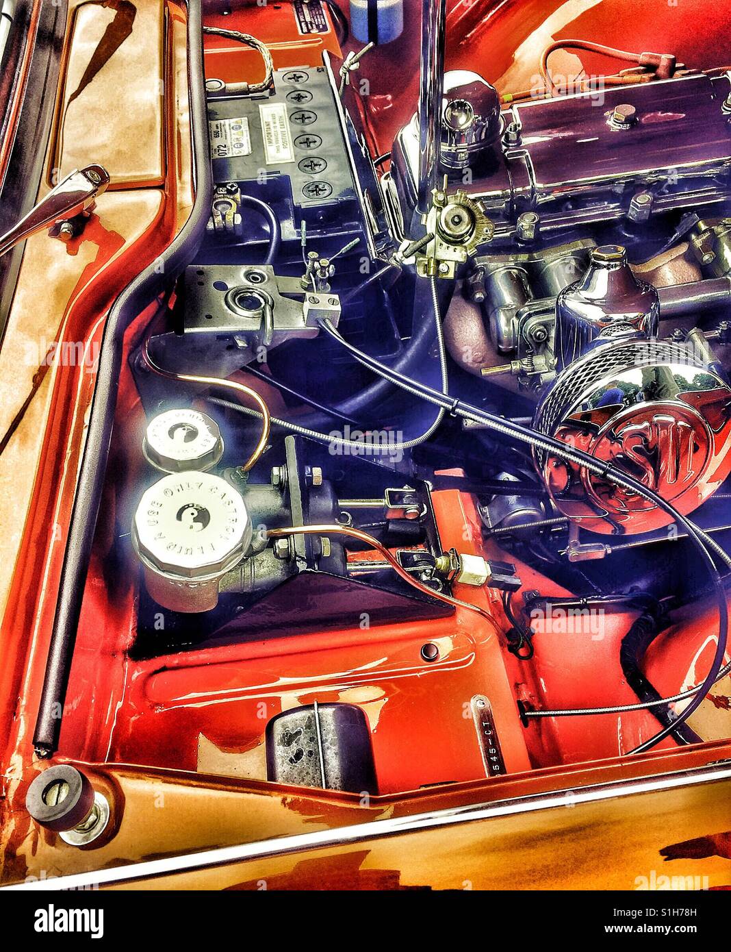 Engine of 1963 Triumph TR4 sports car - Smartphone Captured Stock Image