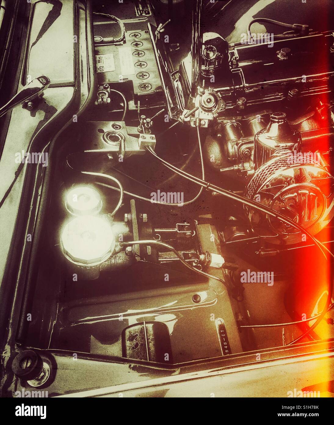 Engine of 1963 Triumph TR4 sports car - Smartphone Captured Stock Image