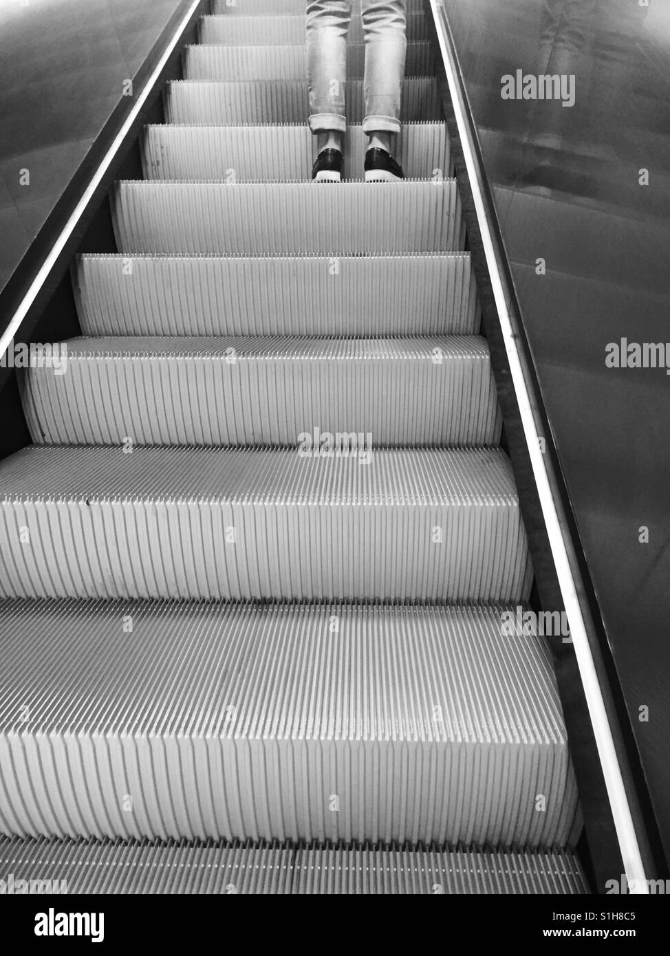 Escalator person urban life stairs automation Stock Photo