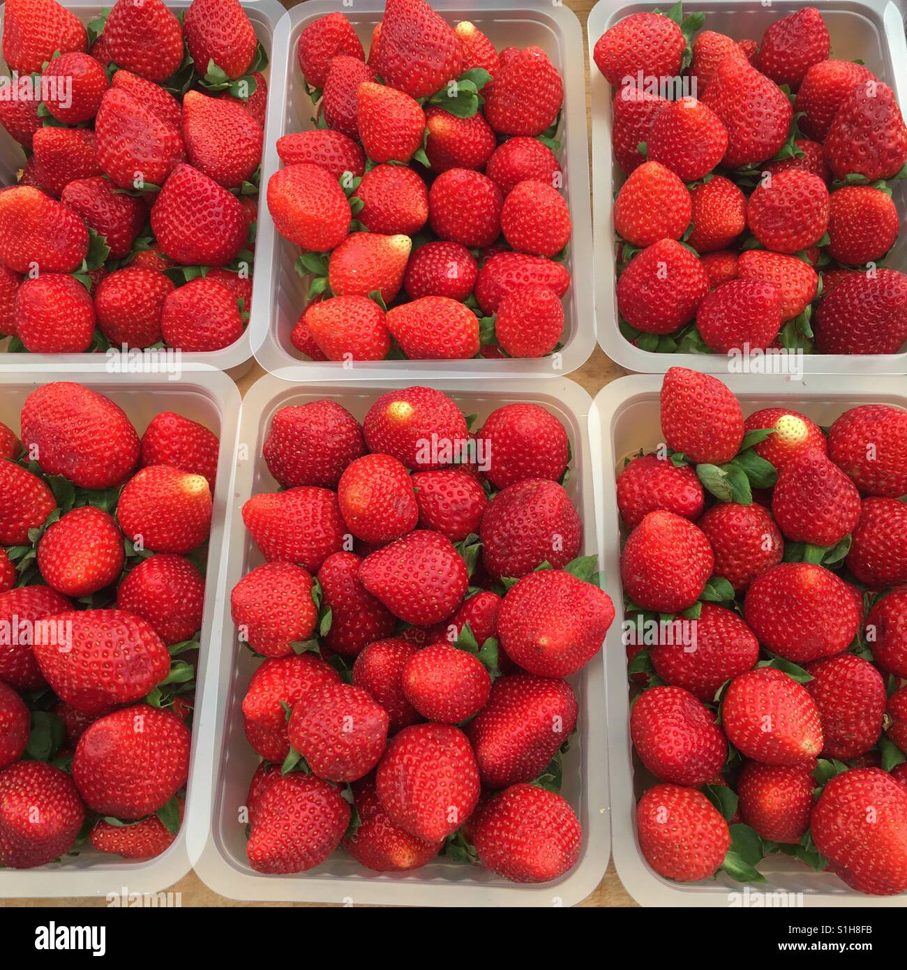 Punnets of strawberries at a market in Mallorca Stock Photo