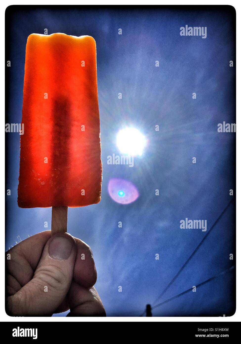 Orange Ice Lolly Stock Photo Alamy