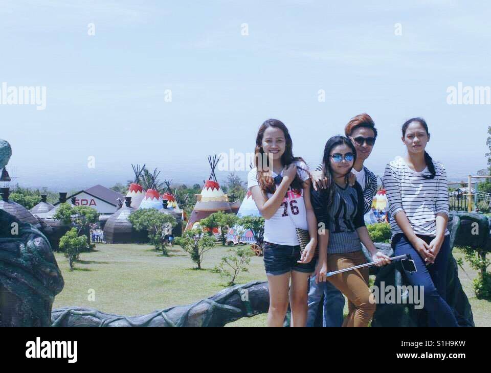 a group of friends enjoying their travel together at campuestuhan resort, talisay city, philippines Stock Photo
