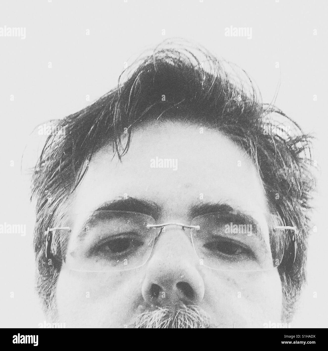 Adult man partial portrait in monochrome - Smartphone Captured Stock Image