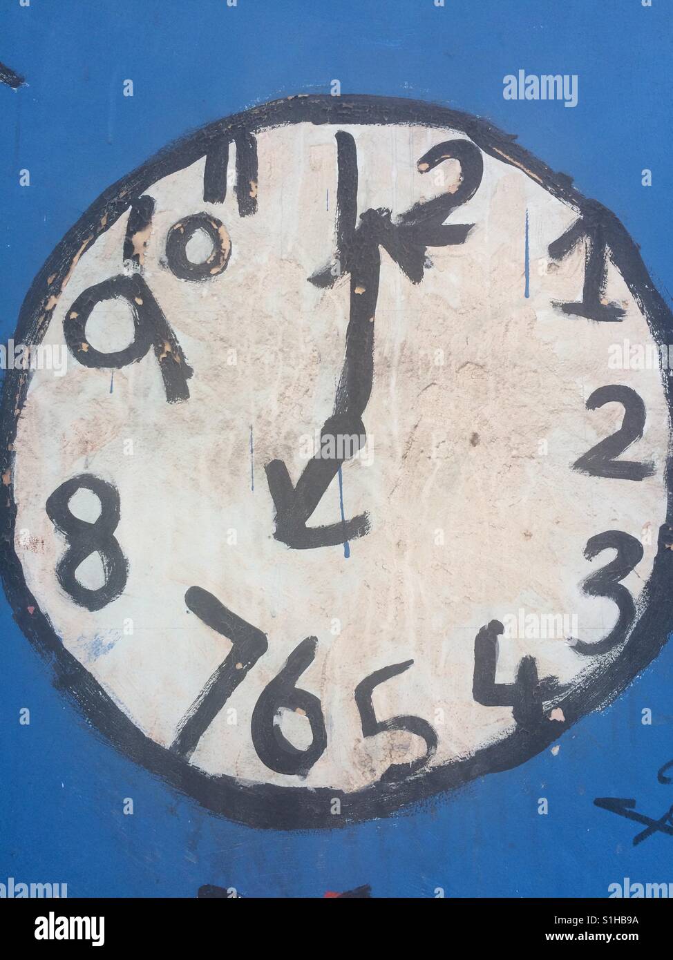 Child's Painting of a clock Stock Photo