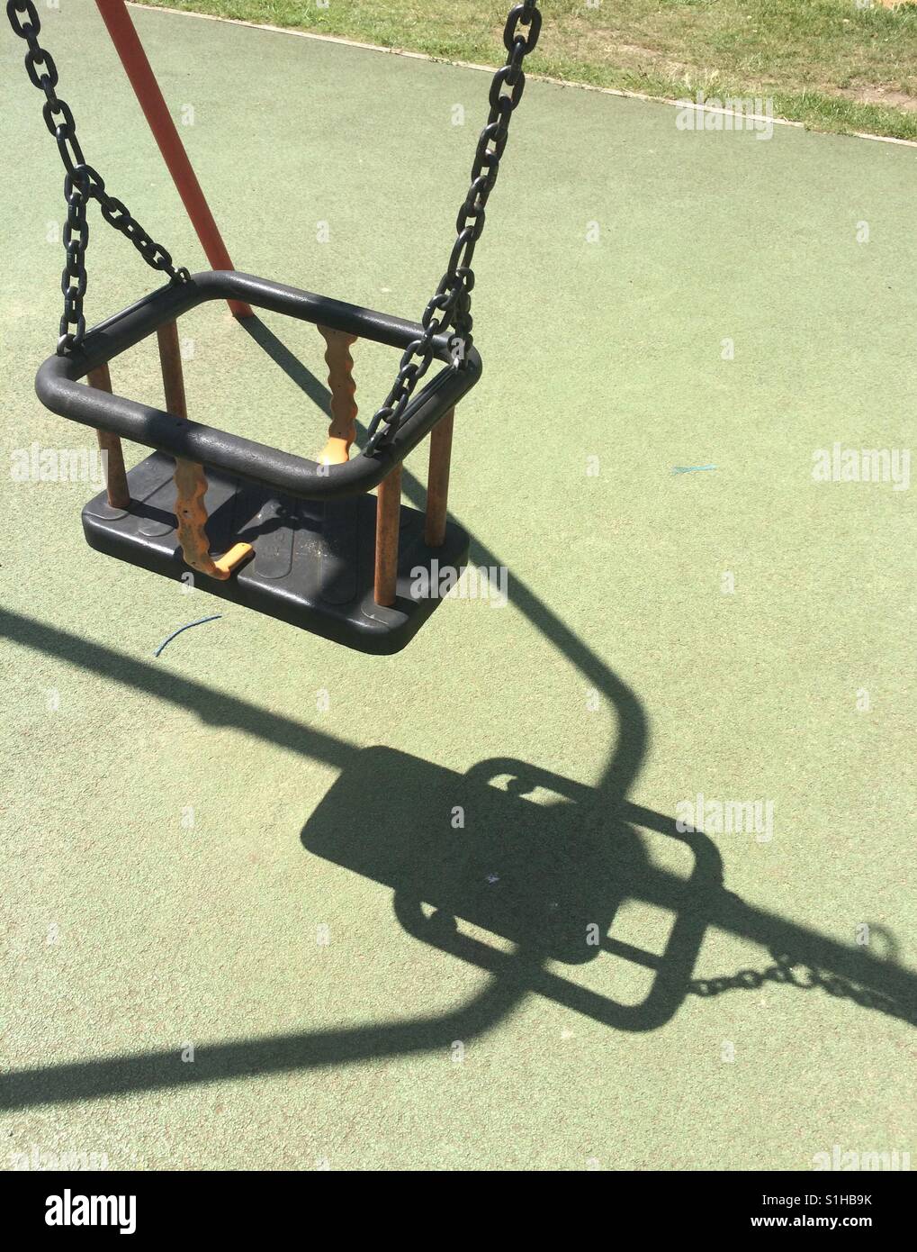 Swing in playground Stock Photo