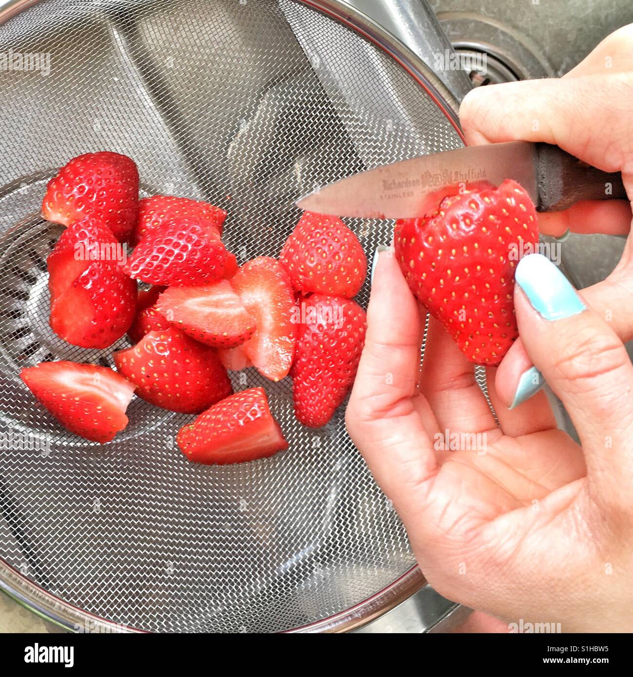 Preparing strawberries - Smartphone Captured Stock Image