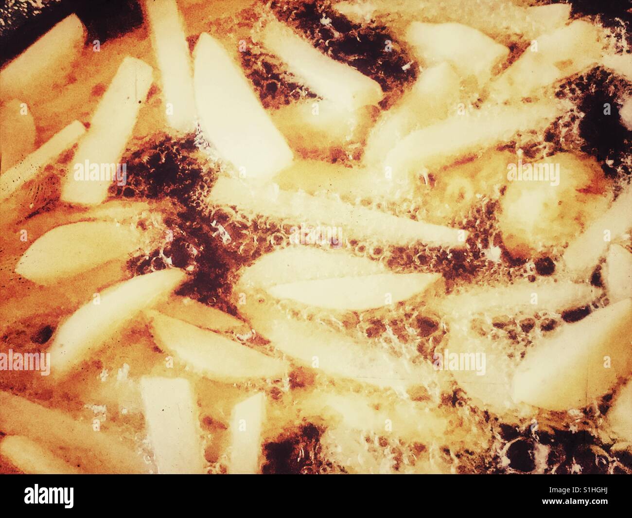 Frying chips oil hires stock photography and images Alamy