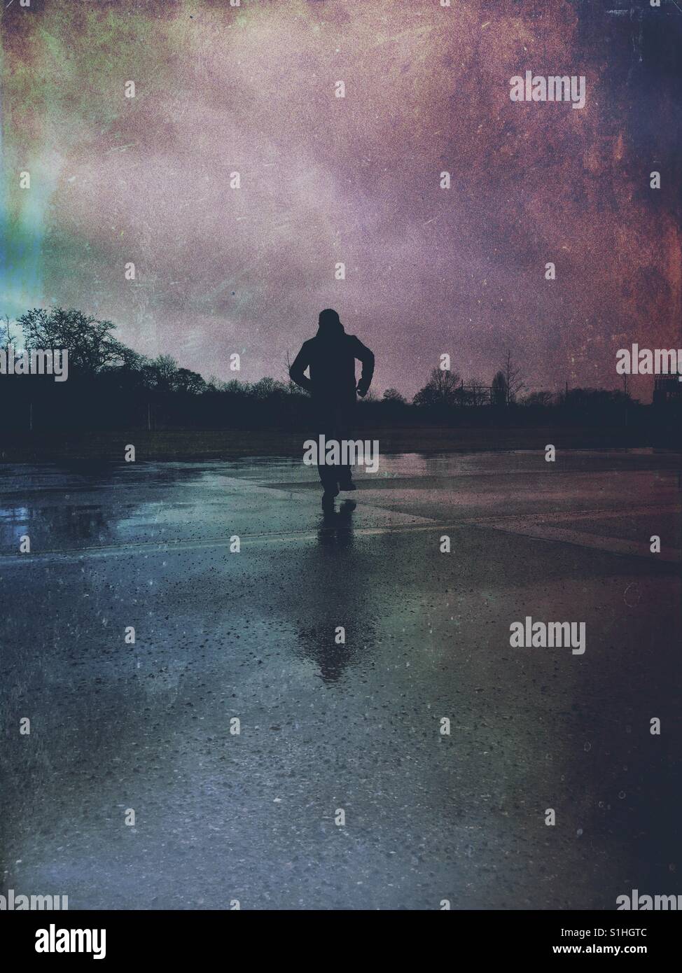 Mysterious male figure running away - Smartphone Captured Stock Image