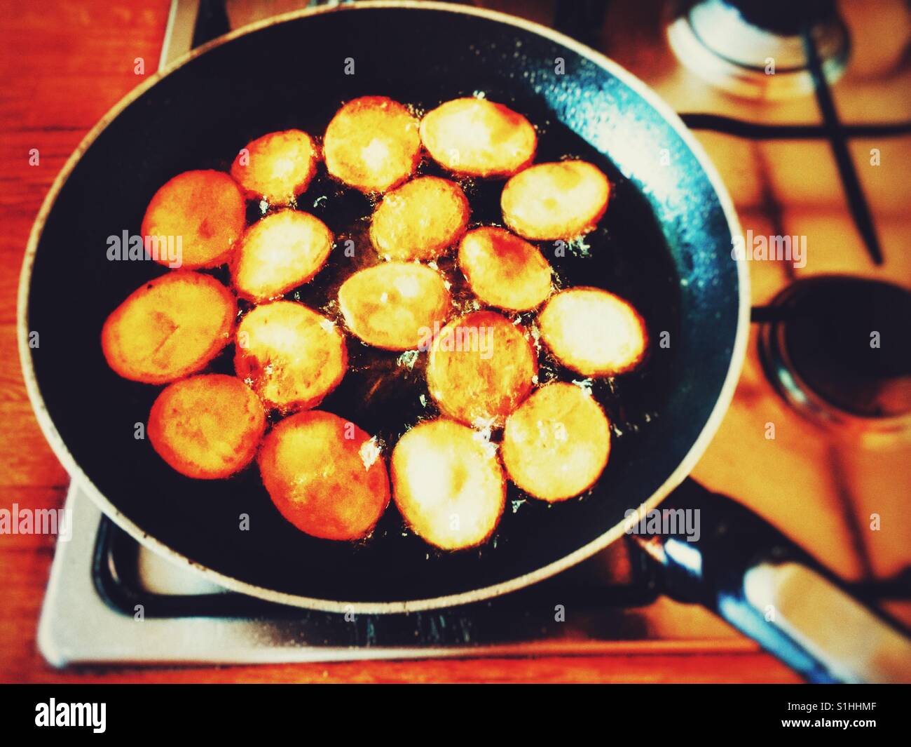 Fried potato medallions Stock Photo