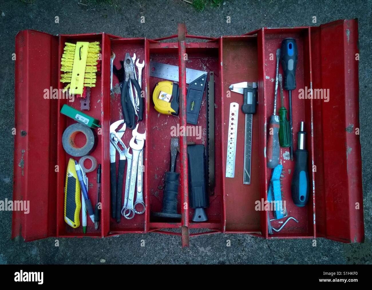 Toolbox. Retro red metal tool box. - Smartphone Captured Stock Image