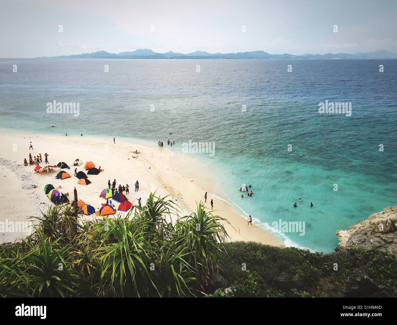 Beach campers at Fortune Island, Nasugbu, Batangas, Philippines Stock