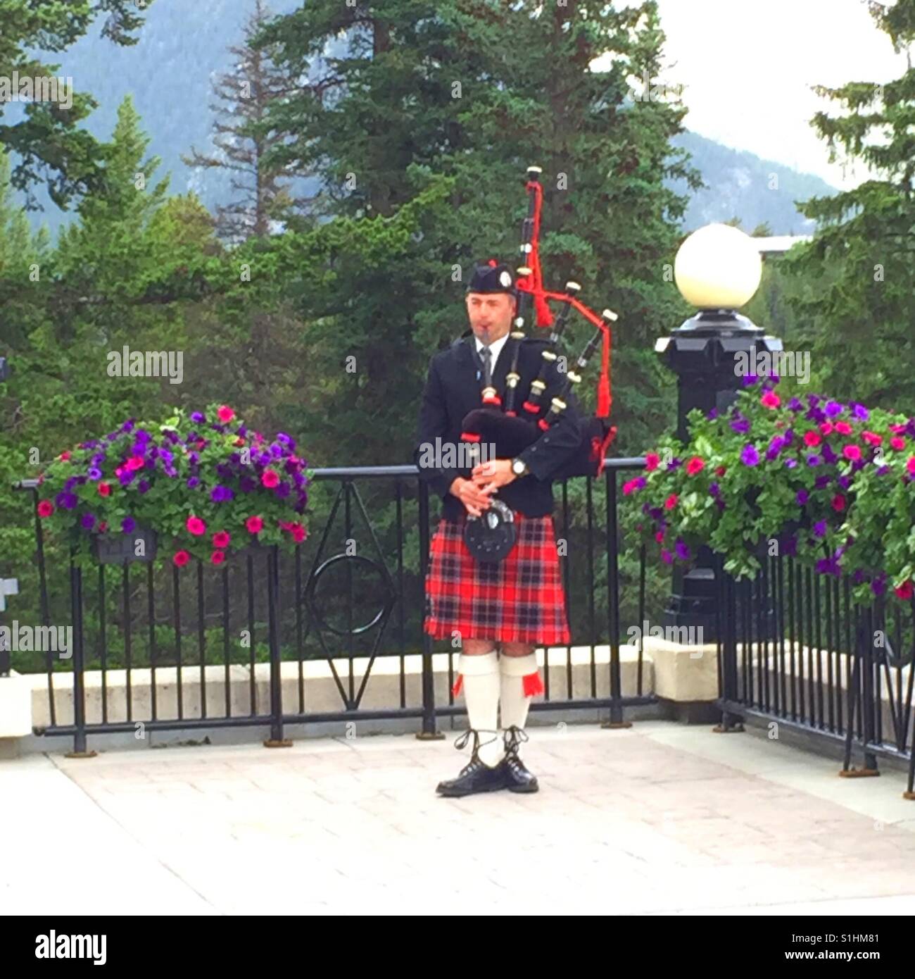 Bag piper in a scenic location - Smartphone Captured Stock Image