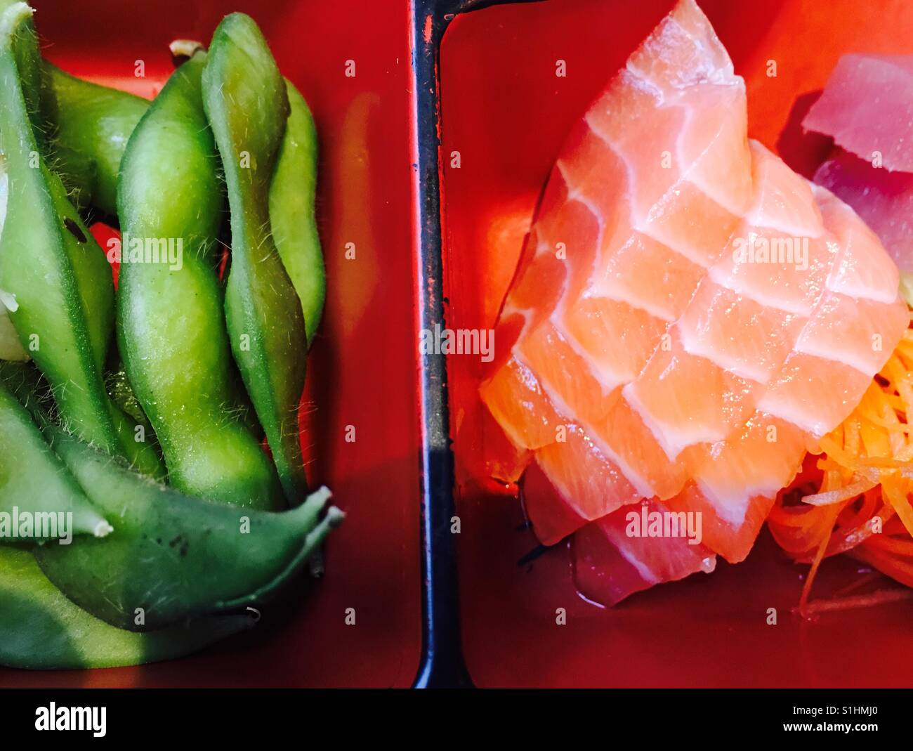 Soya beans and salmon sashimi - Smartphone Captured Stock Image