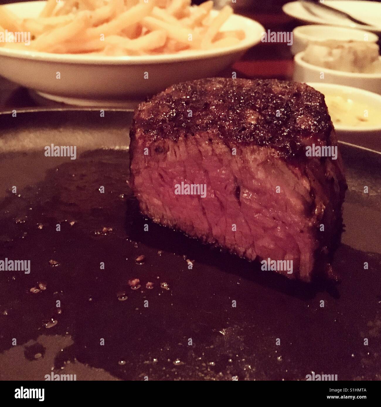 Juicy tenderloin done medium rare, grilled to perfection Stock Photo