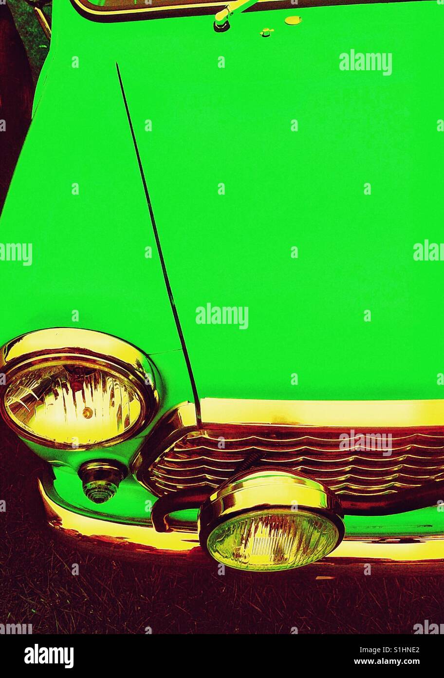 Green classic car hood grille radiator round headlights Stock Photo Alamy
