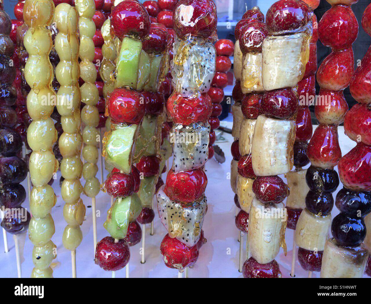 Sugar coated fruits Stock Photo Alamy