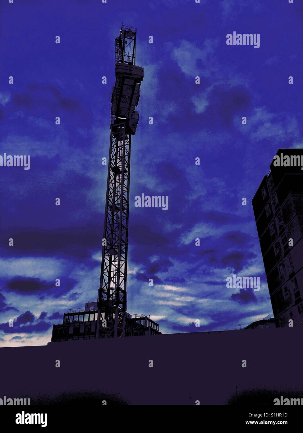 Crane on a building site in London in England - Smartphone Captured Stock Image