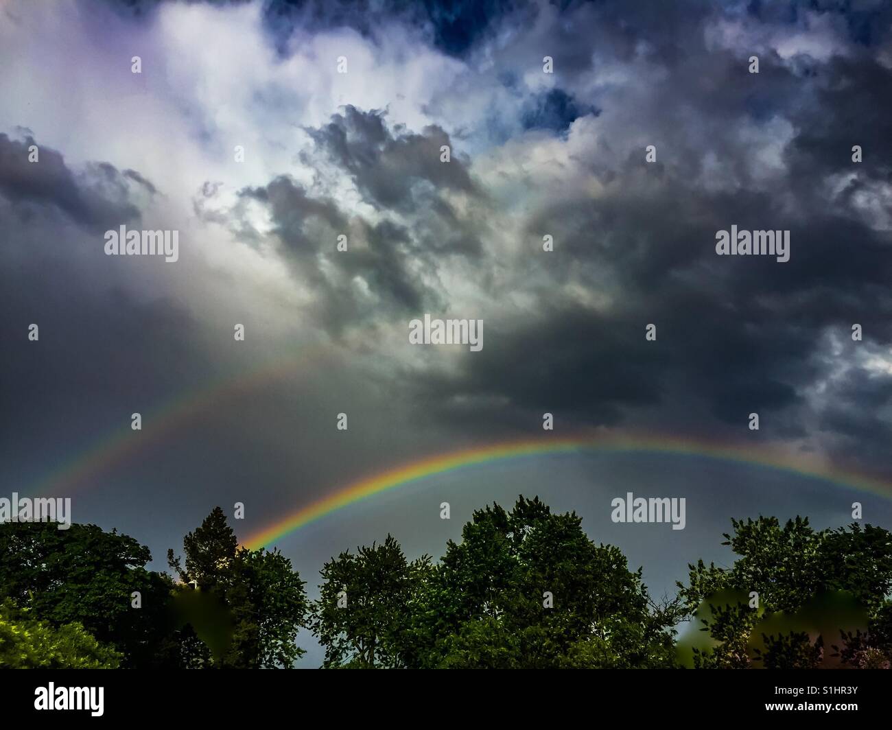 Double rainbow in the city - Smartphone Captured Stock Image Double rainbow in the city - Smartphone Captured Stock Image