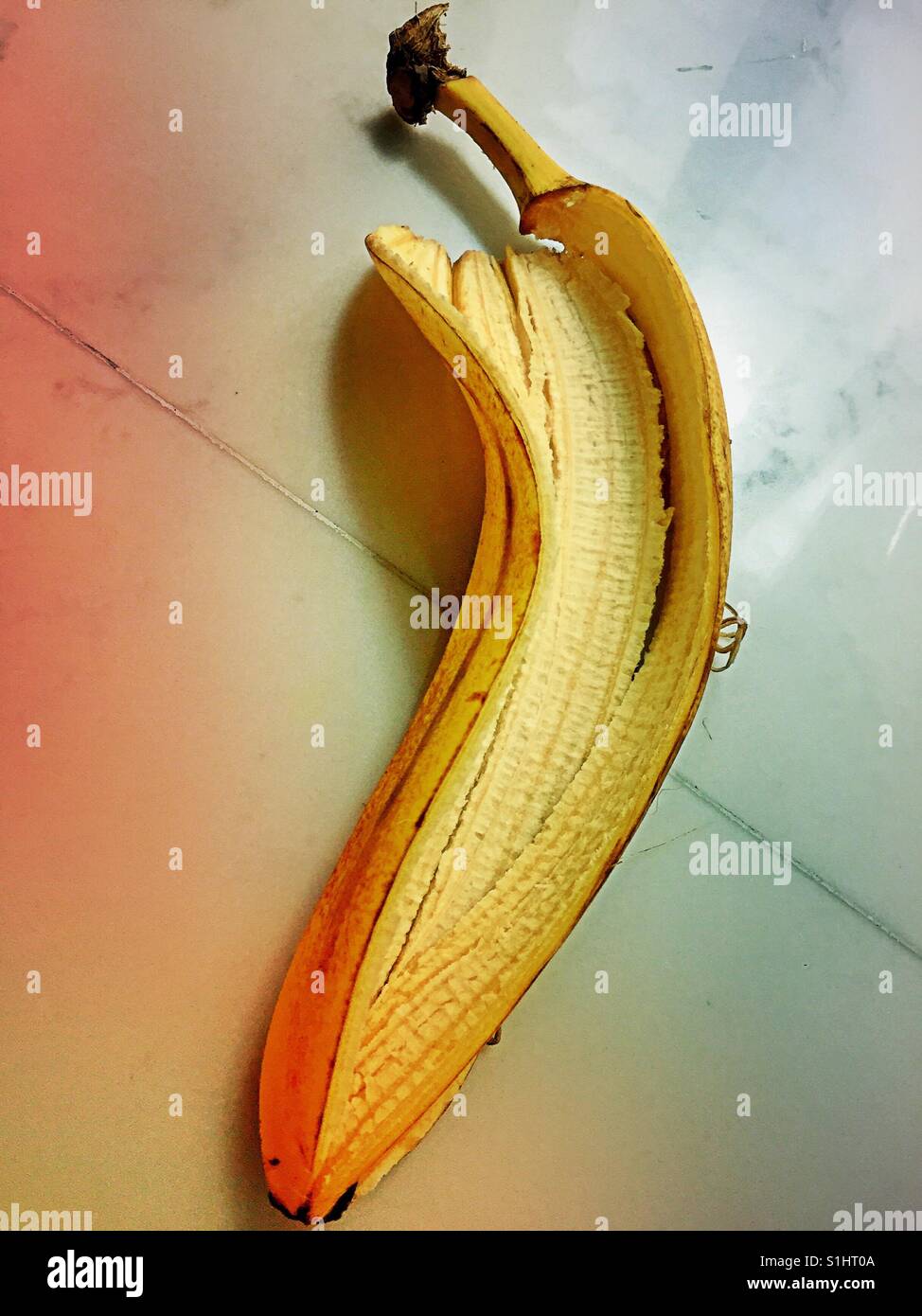 Banana pill with fruit removed close up. - Smartphone Captured Stock Image