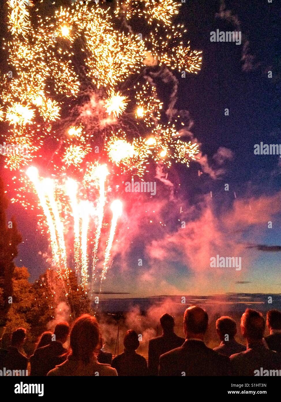 Watching summer fireworks Stock Photo