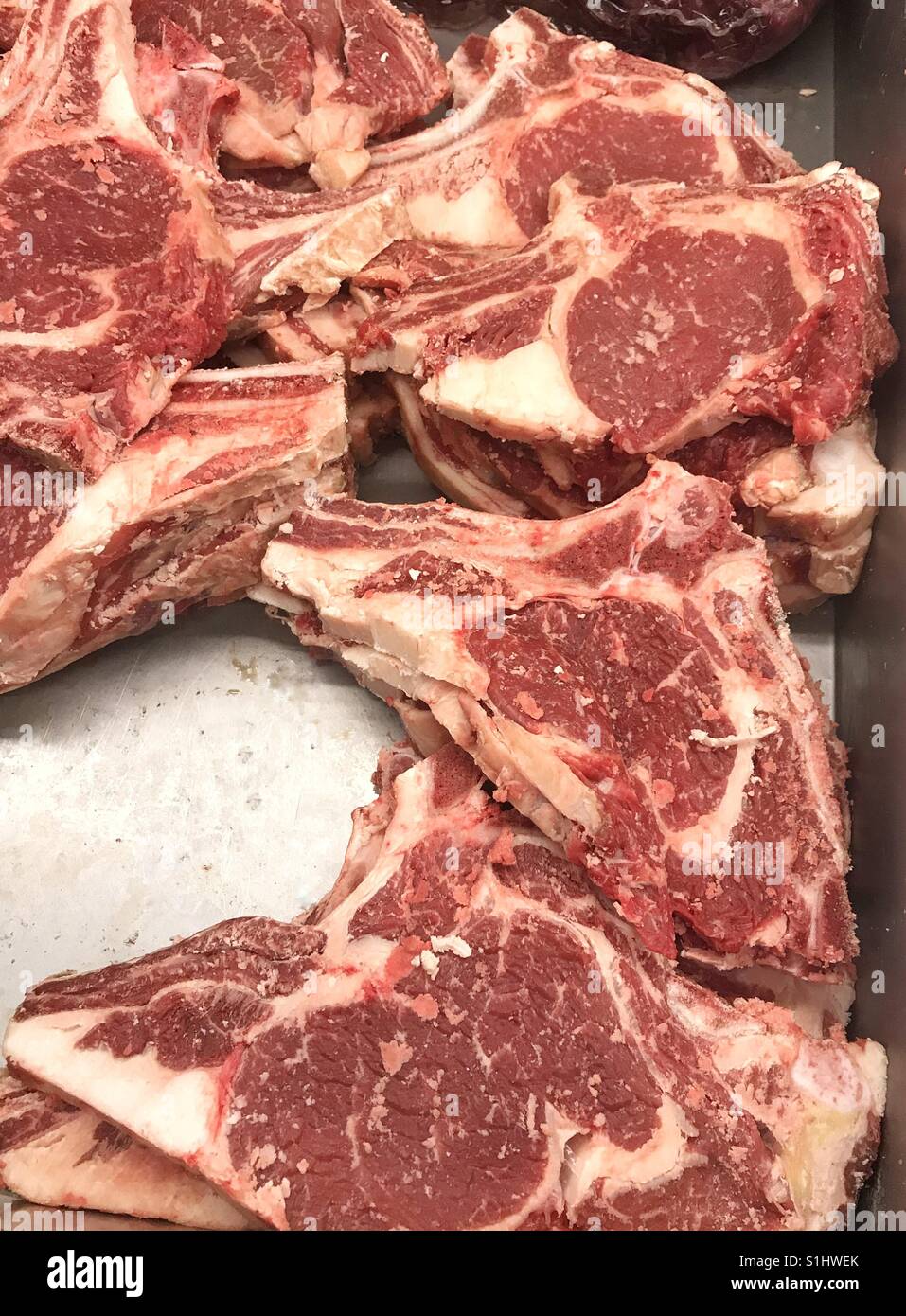 Raw meat in a butchery - Smartphone Captured Stock Image